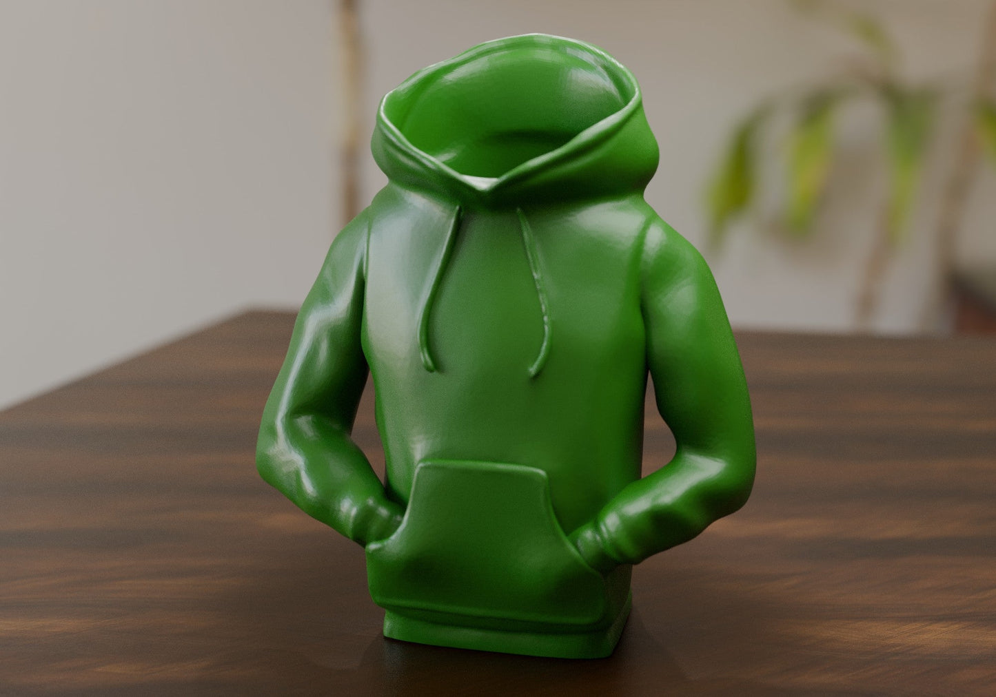 a green toy sitting on top of a wooden table