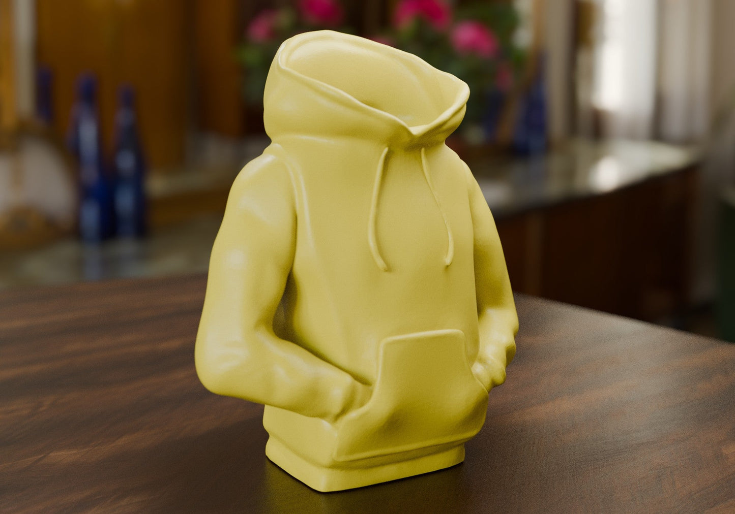 a yellow toy sitting on top of a wooden table