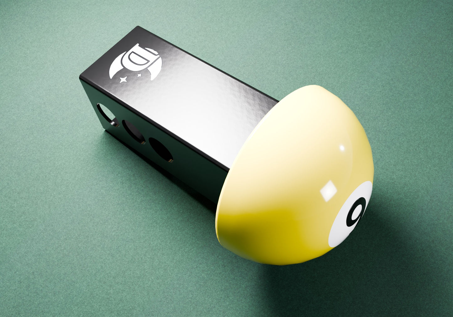 a yellow and black object on a green surface