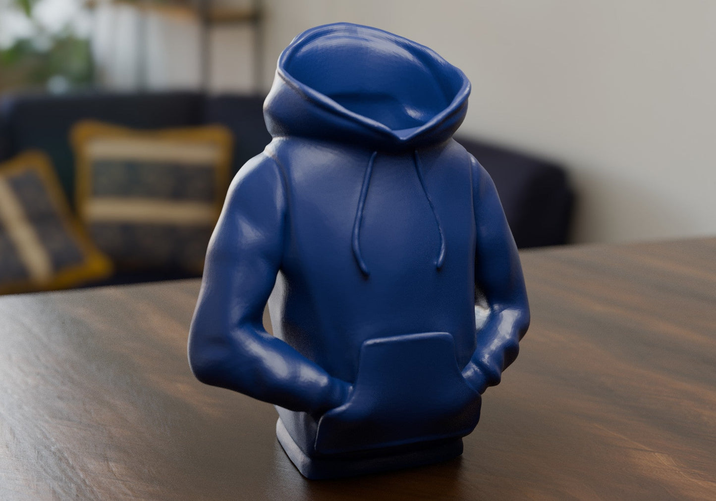 a blue toy sitting on top of a wooden table