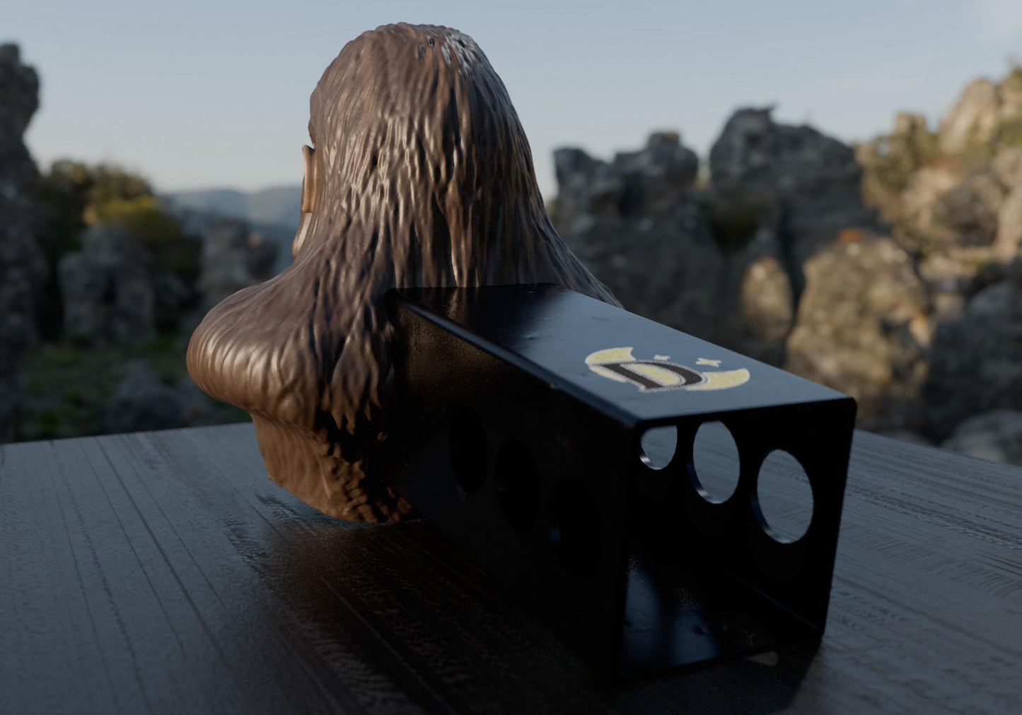 a black object with a long hair sitting on a table