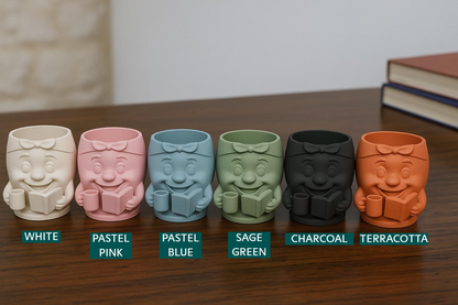 a row of five ceramic cups sitting on top of a wooden table