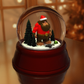 a snow globe with a bear inside of it