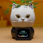 a white cat with a plant on top of it