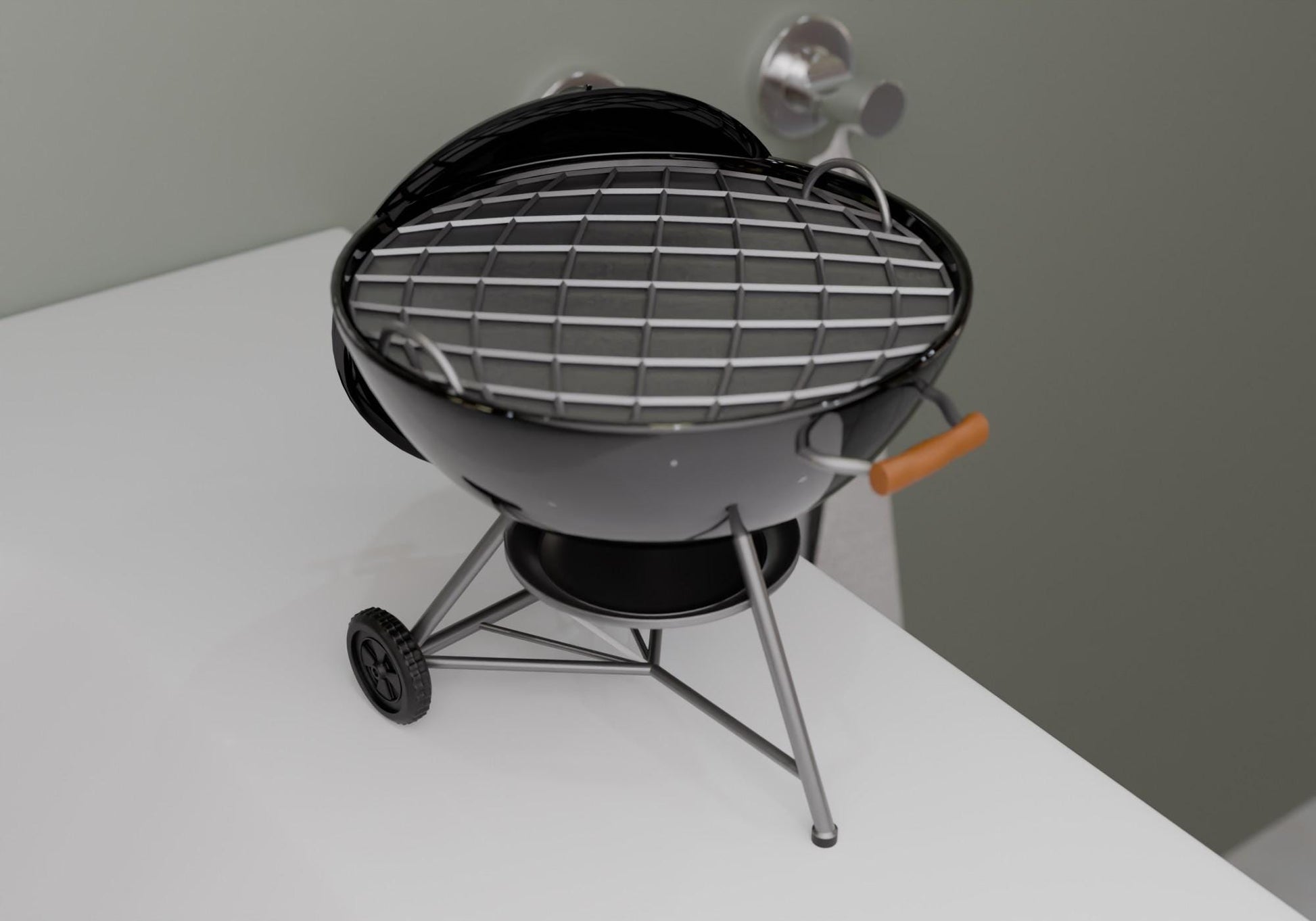 A small black and silver charcoal grill with a wire rack on top, sitting on a white surface.
