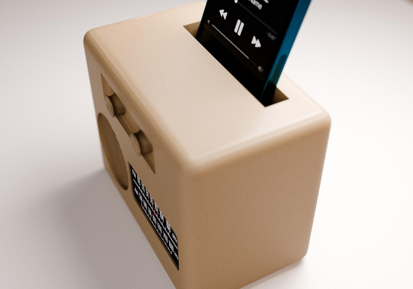 A beige-colored radio device is shown with a smartphone inserted into it, displaying a music player interface.