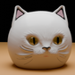 a close up of a cat head on a table