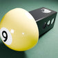 a yellow pool ball sitting on top of a green table
