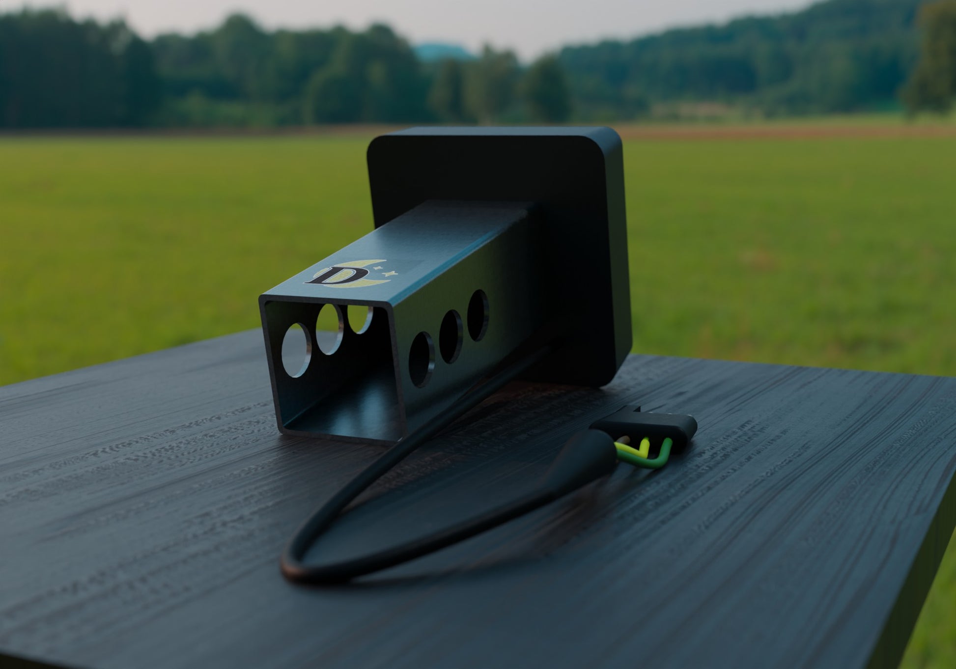 a pair of headphones sitting on top of a wooden table