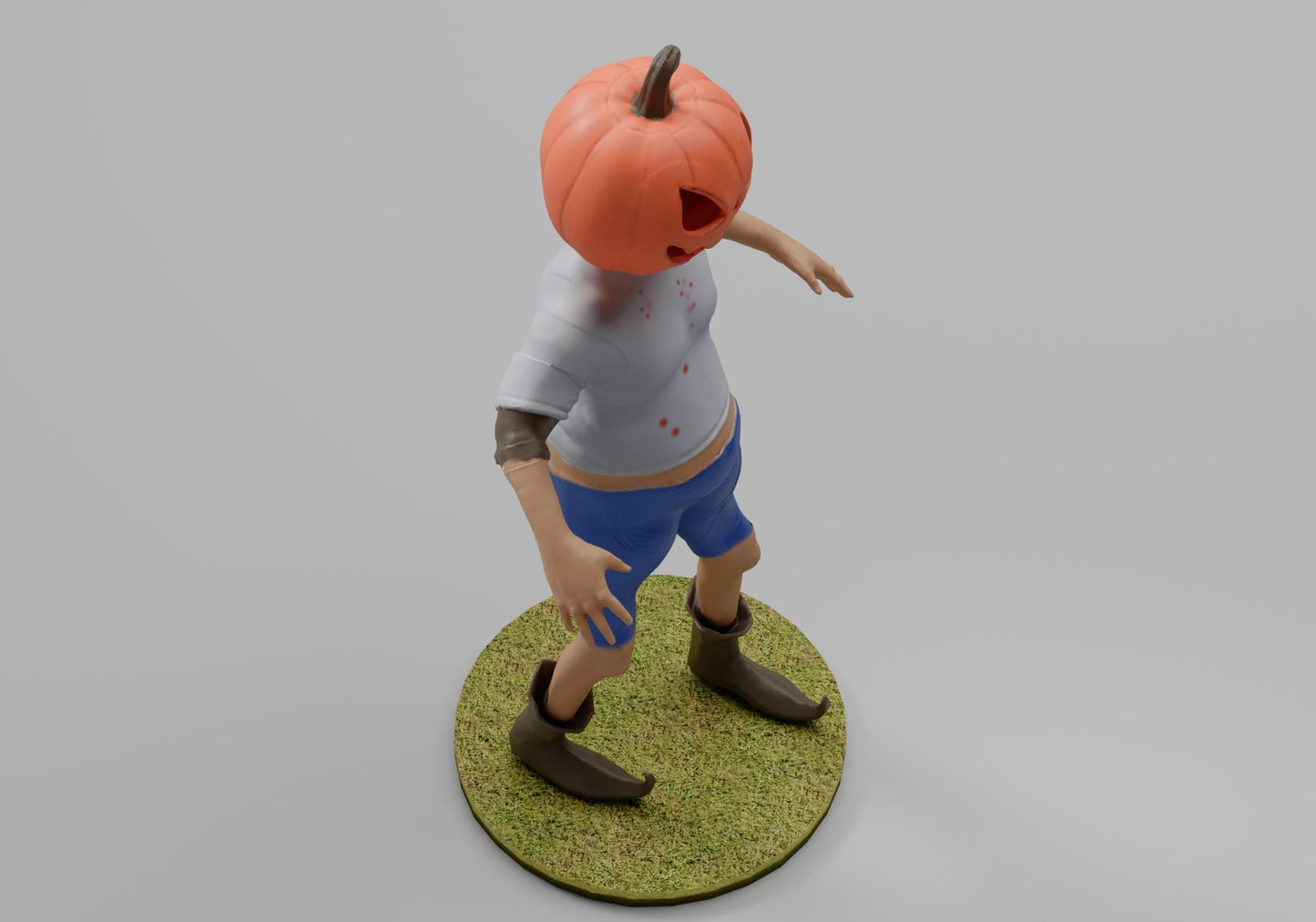 a figurine of a man with a pumpkin on his head