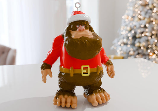 a plastic ornament of a man with a beard