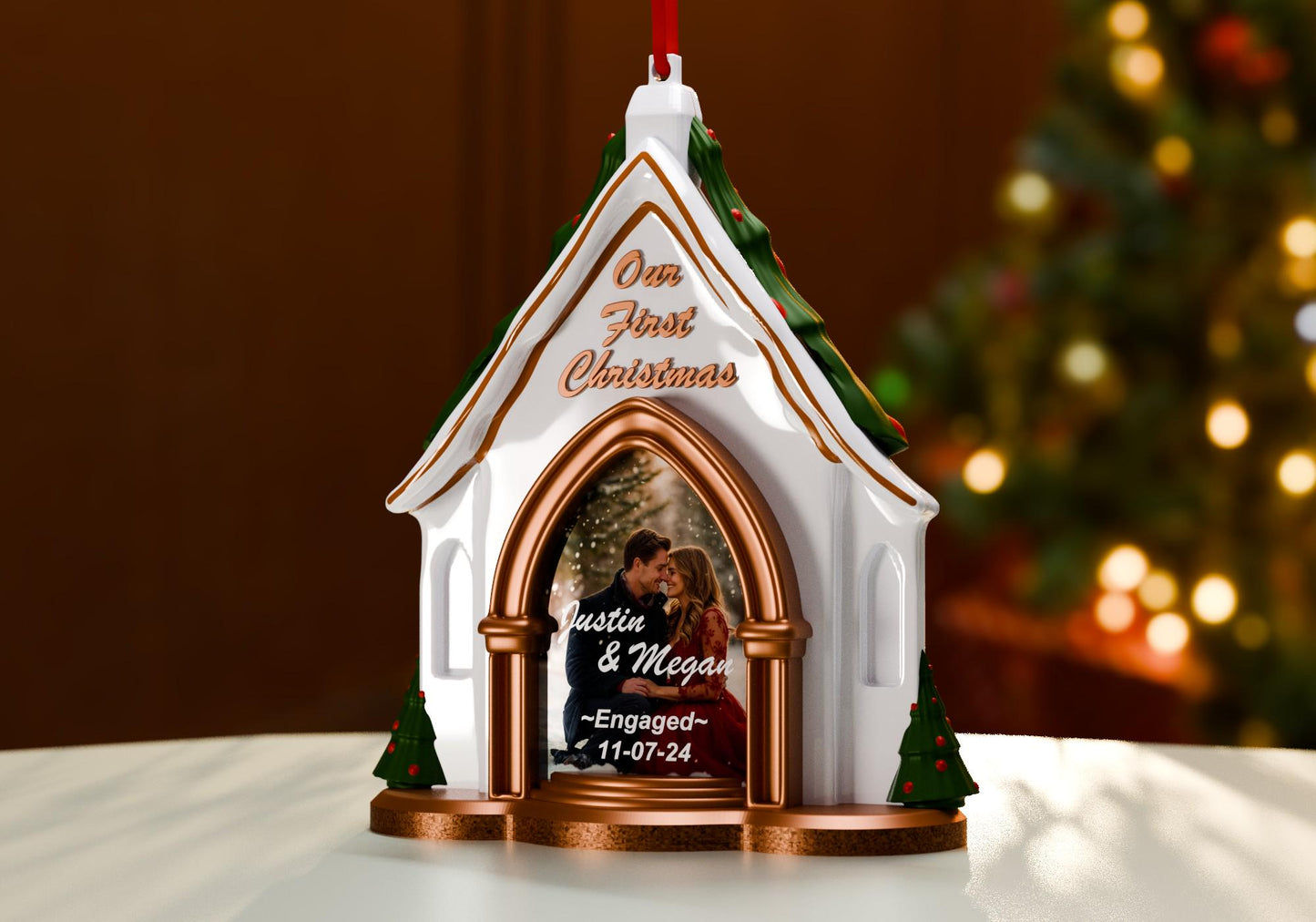 a small white church with a christmas tree in the background