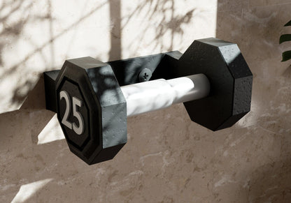a black and white towel holder on a wall