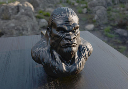 a statue of a gorilla sitting on top of a wooden table