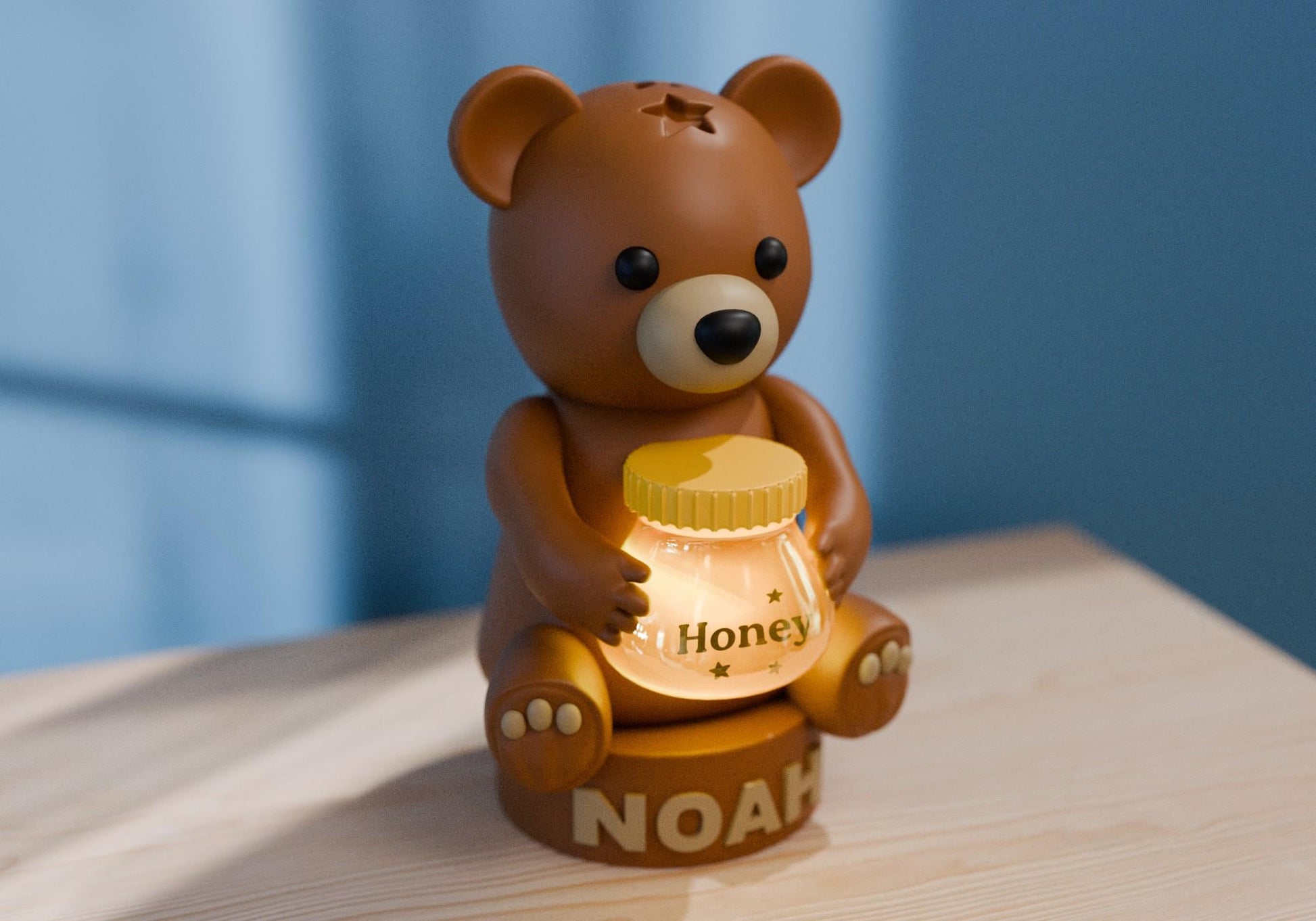 a brown bear sitting on top of a wooden table
