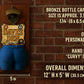 a brick wall with a wooden plaque with a picture of a cartoon character hanging on