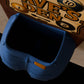 a close up of a blue object on a table