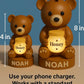 a couple of brown teddy bears sitting next to each other