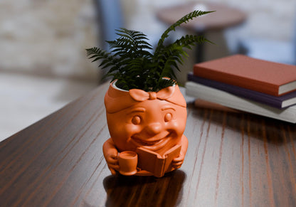 a plant in a vase sitting on a table