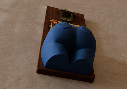 a blue couch sitting on top of a wooden block