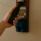 a person is holding a hair dryer in their hand