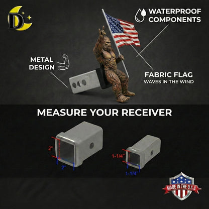 The image is a product advertisement for a tow hitch, featuring a large metal design and a small fabric flag waving in the wind. The ad includes text and measurements to describe the product, such as "METER YOUR RECEIVER" and "WATERPROOF COMPONENTS".